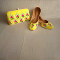 Yellow Floral Handcrafted Jutti & Clutch Combo Set