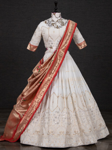 Amrut - The Fashion Icon - Shanaya Khan slays Amrut's Red Bridal Lehnega  Choli, consisting of an off-white lehenga with the combination of a reddish  maroon choli and two dupattas. The lehenga